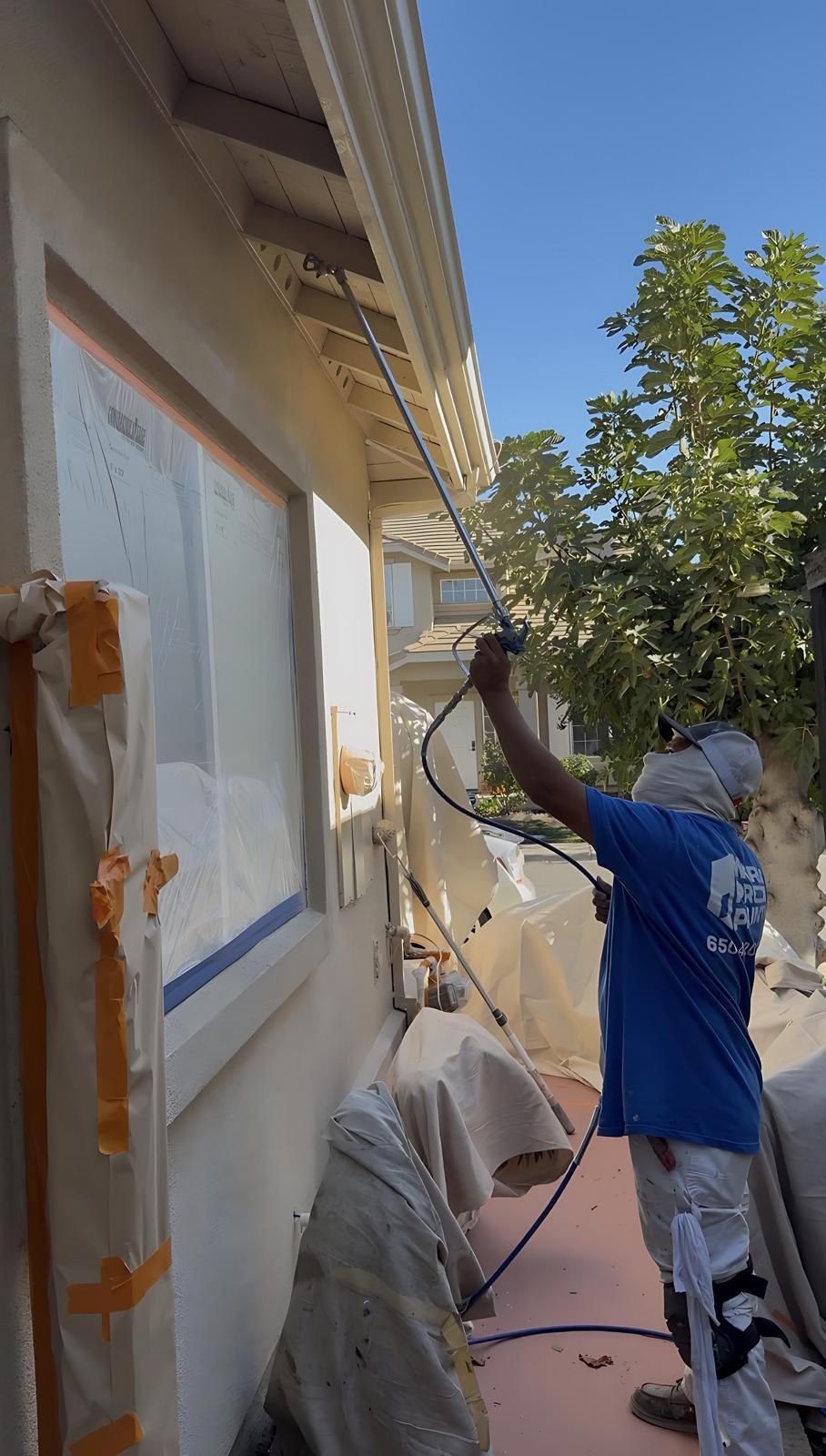 Professional exterior painting team at work - Exterior Painting Contractor